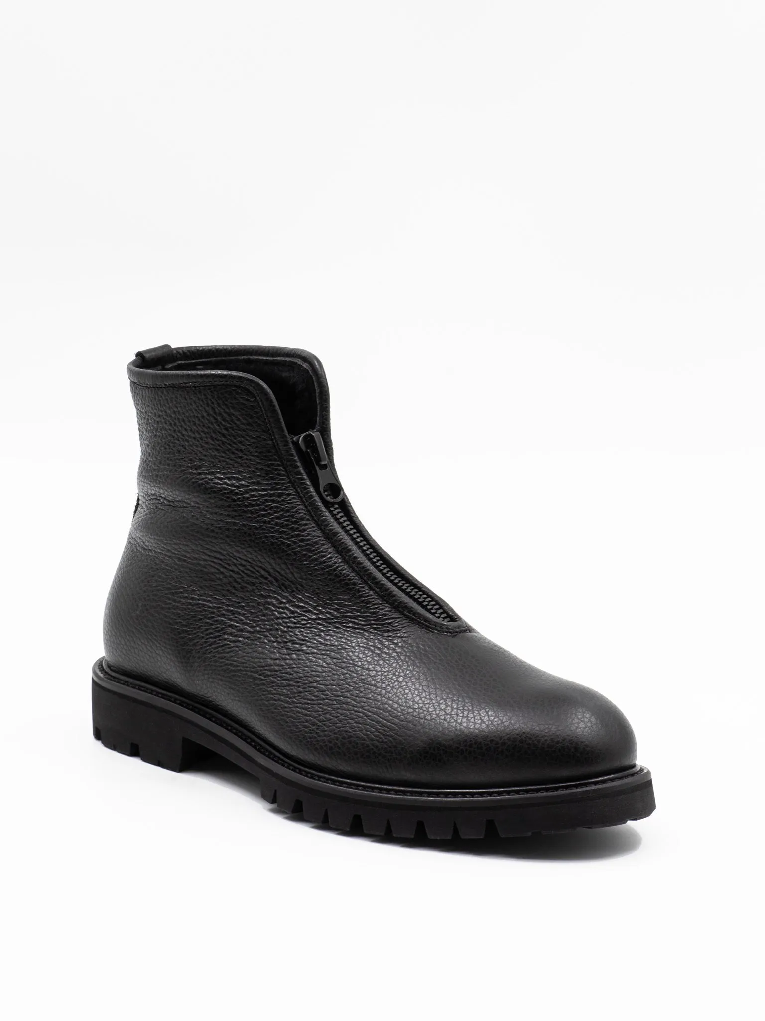 Zip-front shearling-lined ankle boots in grained leather